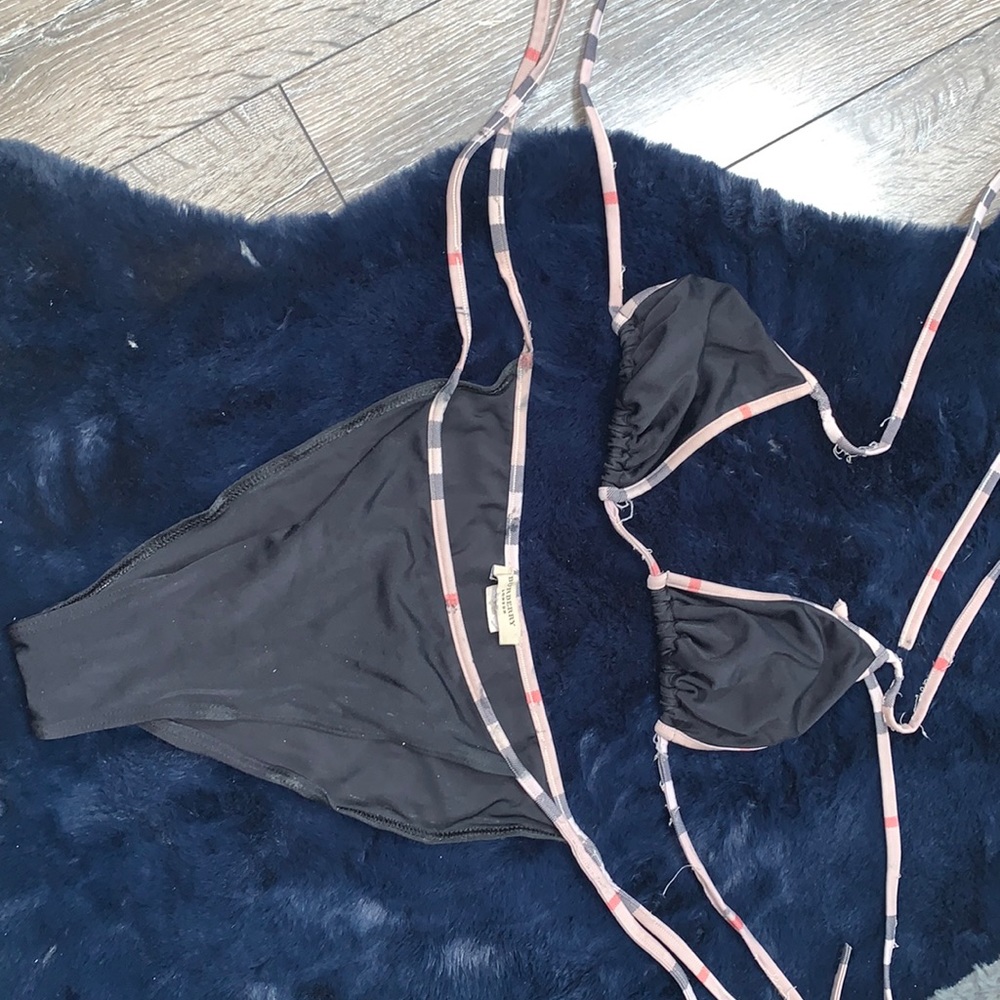Burberry swim Black VERY WORN fits like a small or medium but size is a large